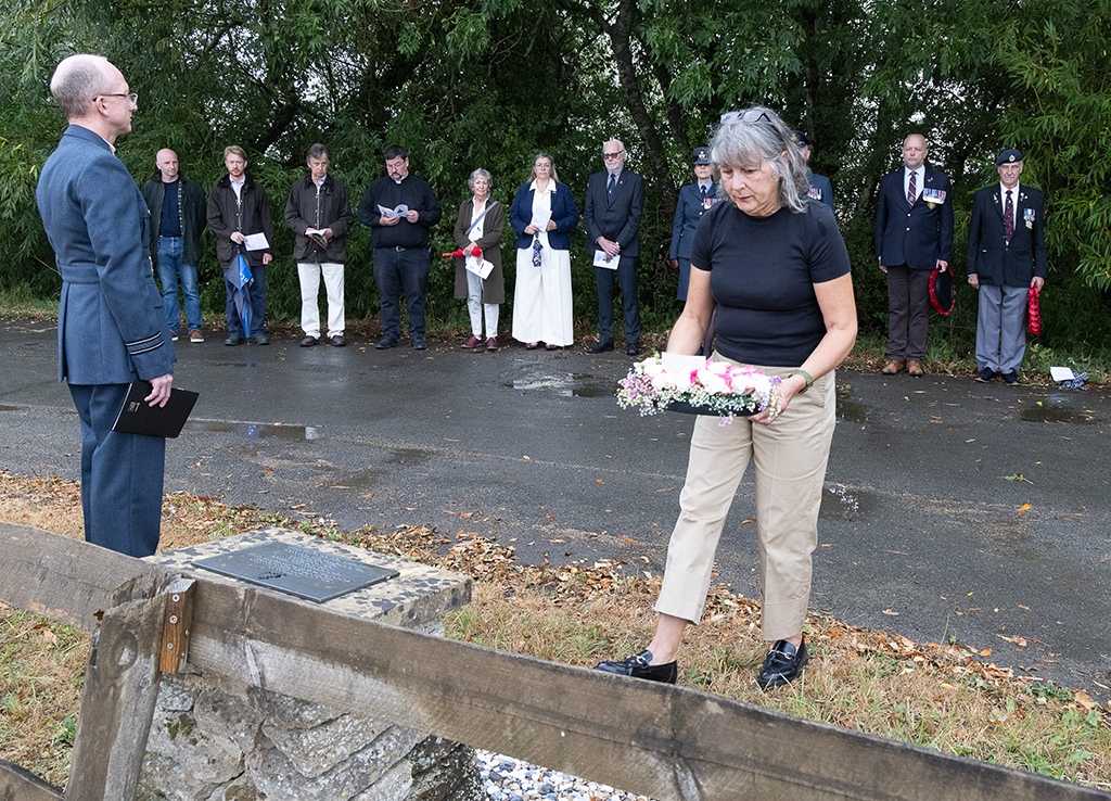 Yvette Short, great niece of Flight Sergeant William Frederick Insley, lays her wreath on behalf of the family.